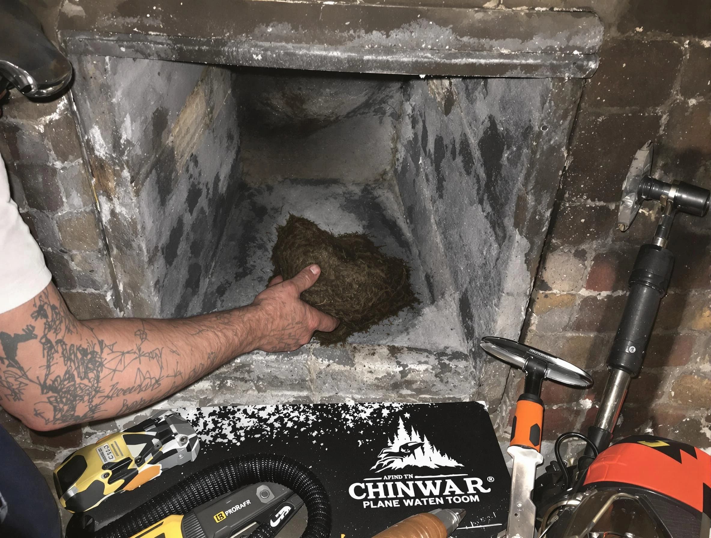 Canton Chimney Sweep safely removing debris and screening chimney in Canton, MA
